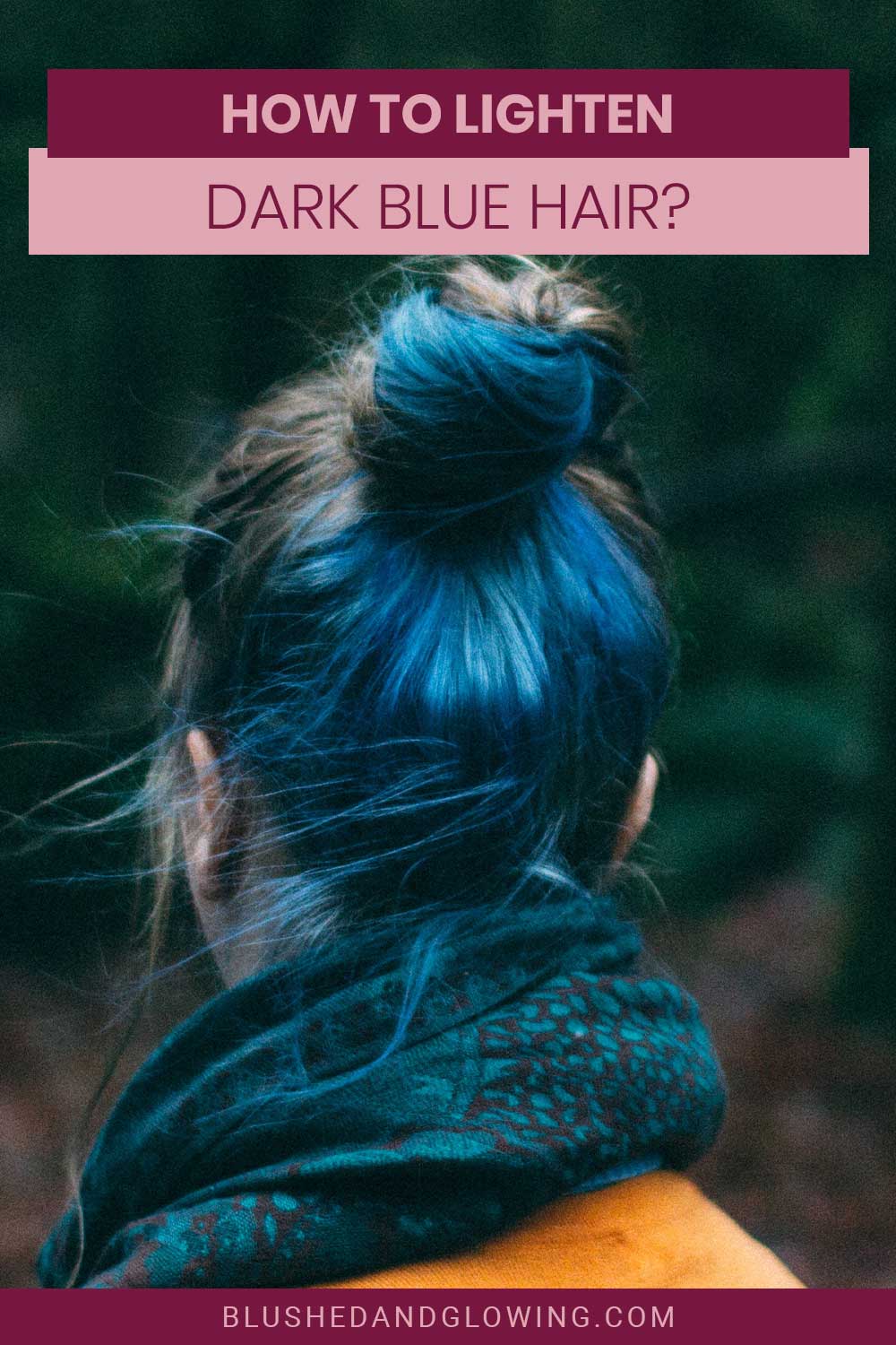 Woman with blue and black hair bun from behind - How To Lighten Dark Blue Hair?