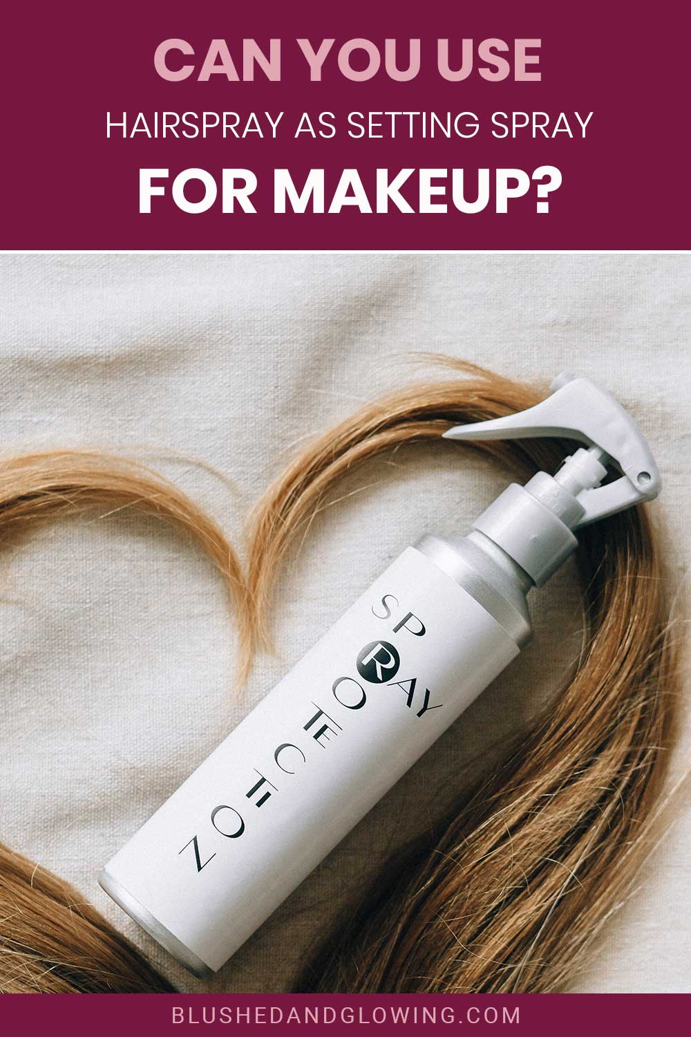 A hairspray bottle lying on hair on white cloth - Can You Use Hairspray As Setting Spray For Makeup?