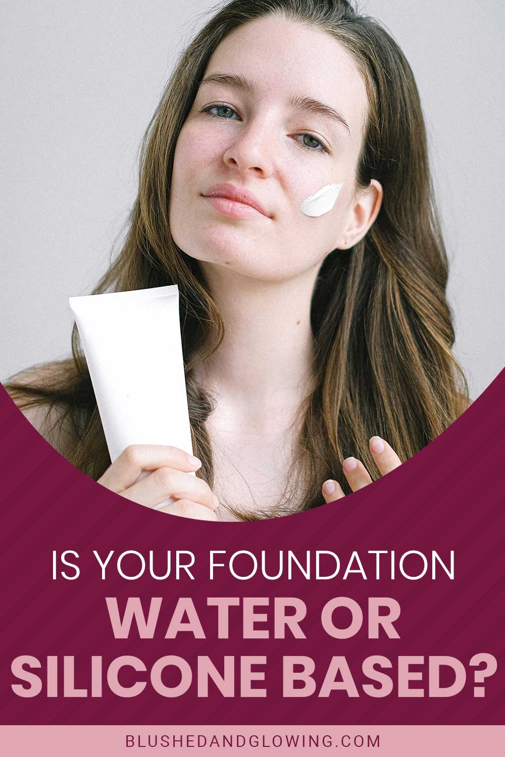 Woman holding a white tube while a bit of foundation is on her face - Is Your Foundation Water Or Silicone Based?