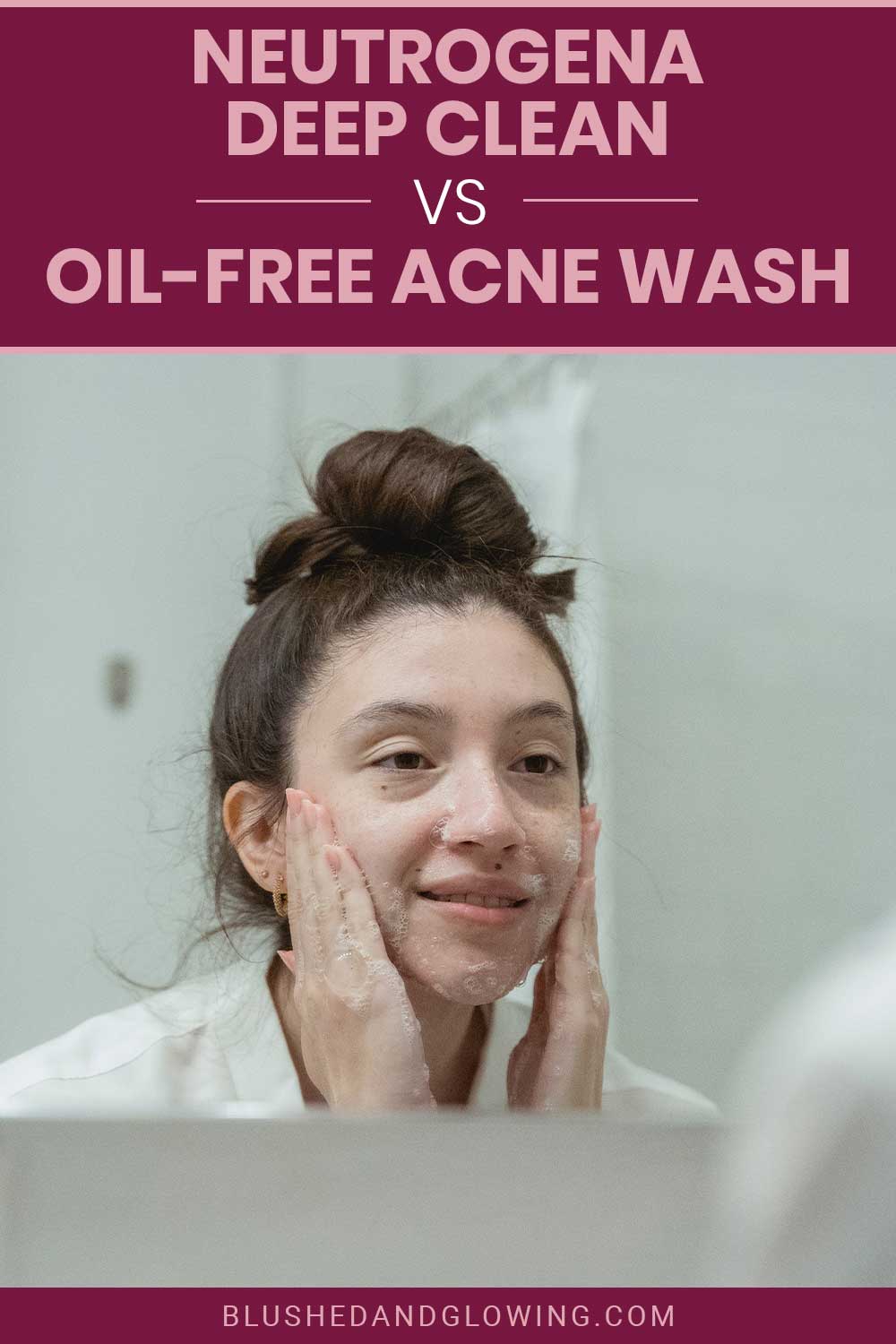 Woman smiling and applying facewash on her face - Neutrogena Deep Clean vs. Oil-Free Acne Wash.